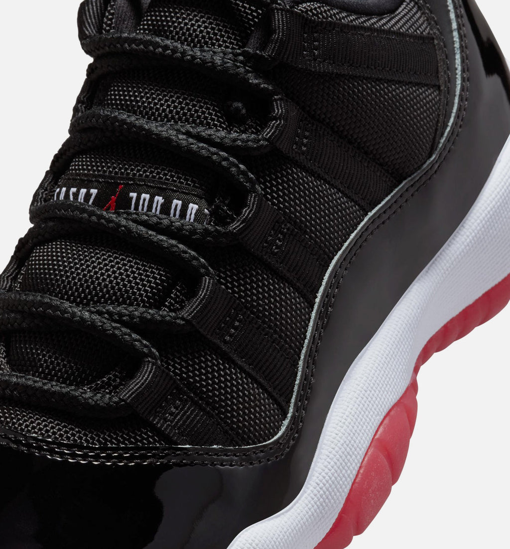 Air Jordan 11 Retro Bred – Grade School Lifestyle Shoe (Black/Varsity Red/White)
