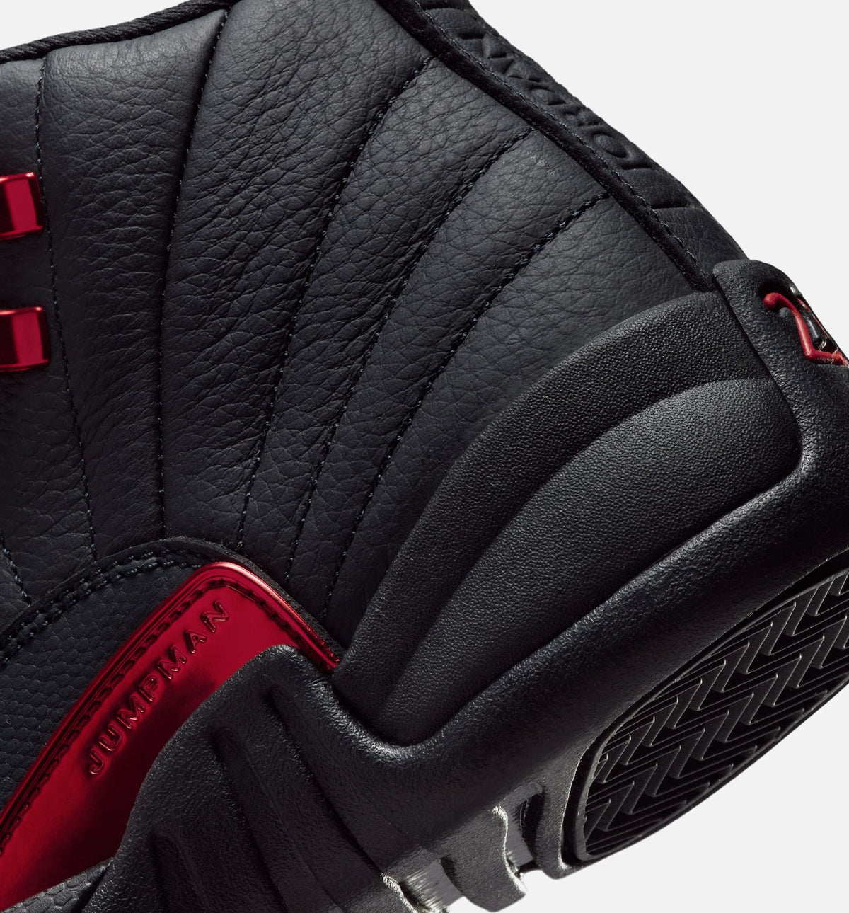 Air Jordan 12 Retro Bloodline – Grade School Lifestyle Shoe (Black/Varsity Red)