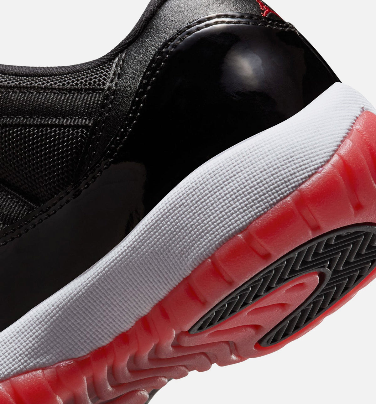 Air Jordan 11 Retro Bred – Grade School Lifestyle Shoe (Black/Varsity Red/White)